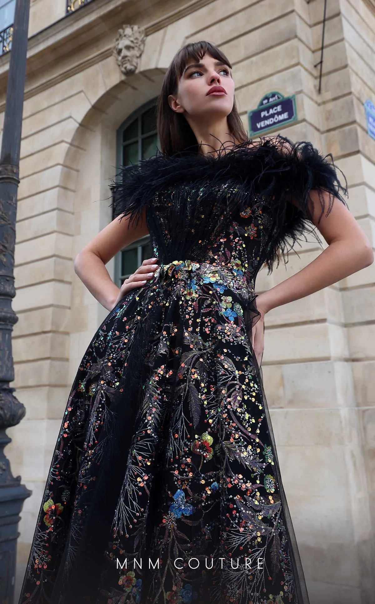 MNM Couture K4021 : Couture Drama in a Strapless Feathered Gown.