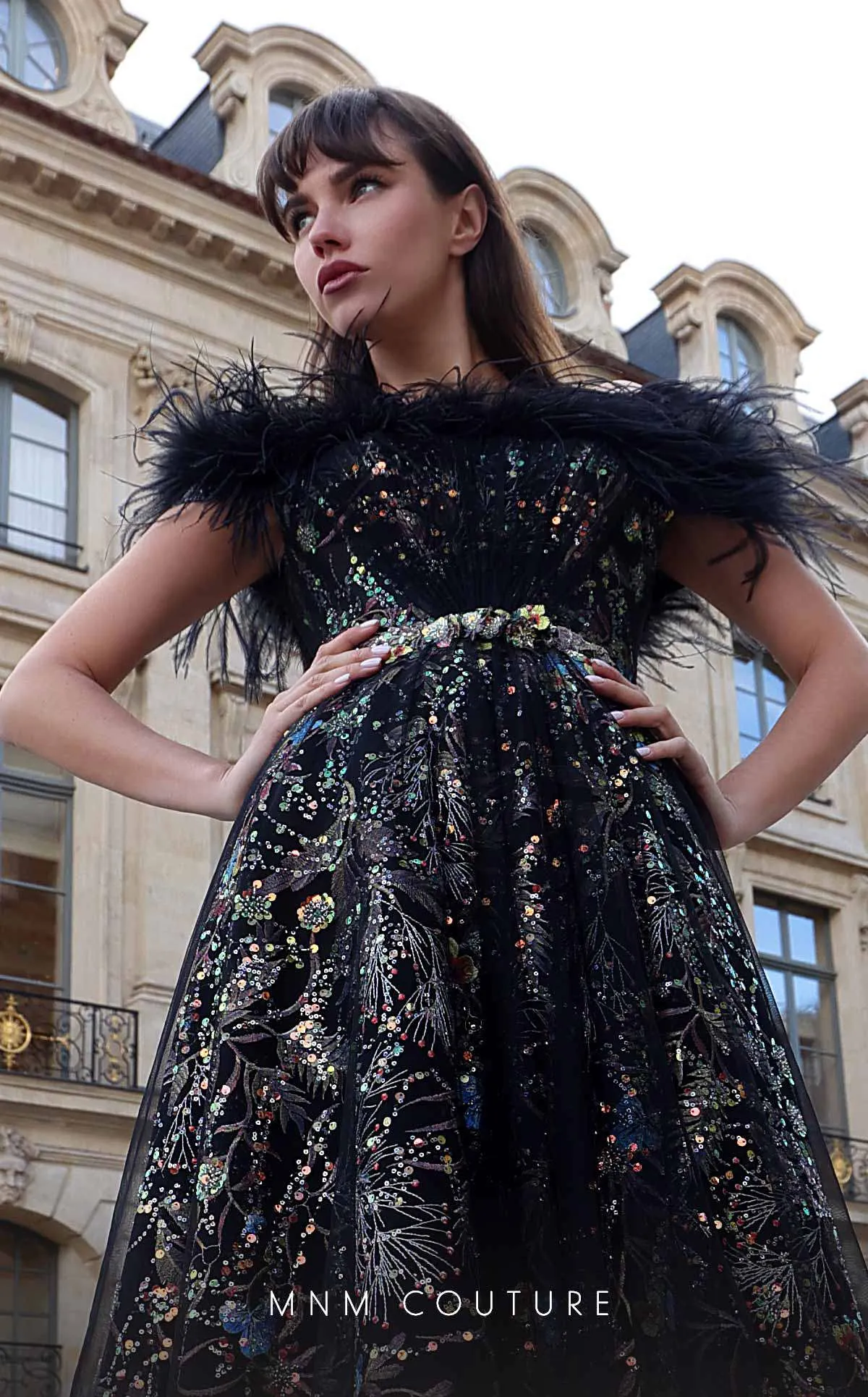 MNM Couture K4021 : Couture Drama in a Strapless Feathered Gown.
