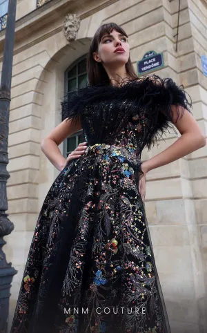 MNM Couture K4021 : Couture Drama in a Strapless Feathered Gown.